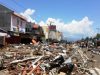 Indonesia races to aid quake, tsunami victims as toll passes 840